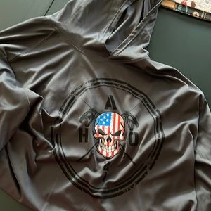 Men’s performance wear  hooded and long sleeved  Rash guard type fabric